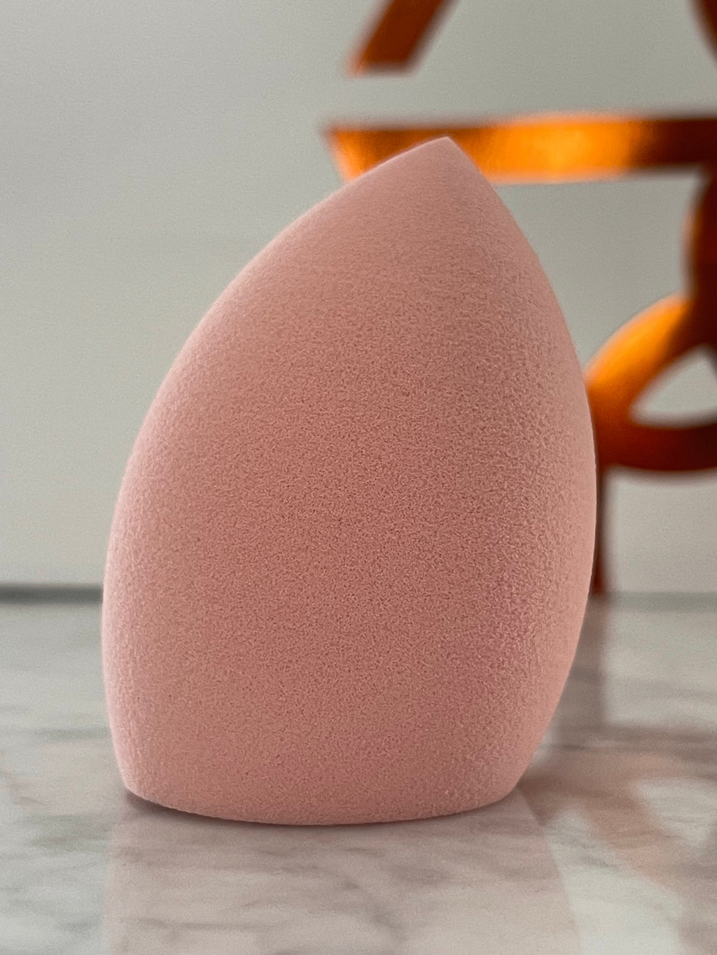Pink Potion bevel shaped makeup sponge - Peach